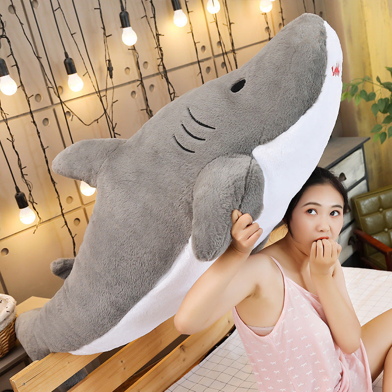 Shark plush pillow | Brodtica.com - Brodtica Shark plush pillow | Brodtica.com Brodtica.com | USA Soft and plush pillow designed to look like a shark, perfect for adding a unique and playful touch to any room decor. Category: plush doll Modeling category: Animal Packing method: waterproof bag, other Filling material: PP cotton Plush classification: plush 3C configuration category: toys over 14 years old Color: blue, pink, gray Height: 50cm, 75cm,100cm